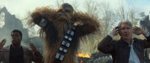 Star Wars: The Force AwakensL to R: Finn (John Boyega), Chewbacca (Peter Mayhew), and Han Solo (Harrison Ford)Ph: Film Frame© 2014 Lucasfilm Ltd. & TM. All Right Reserved..